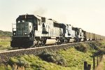 Loaded coal train rolls east
